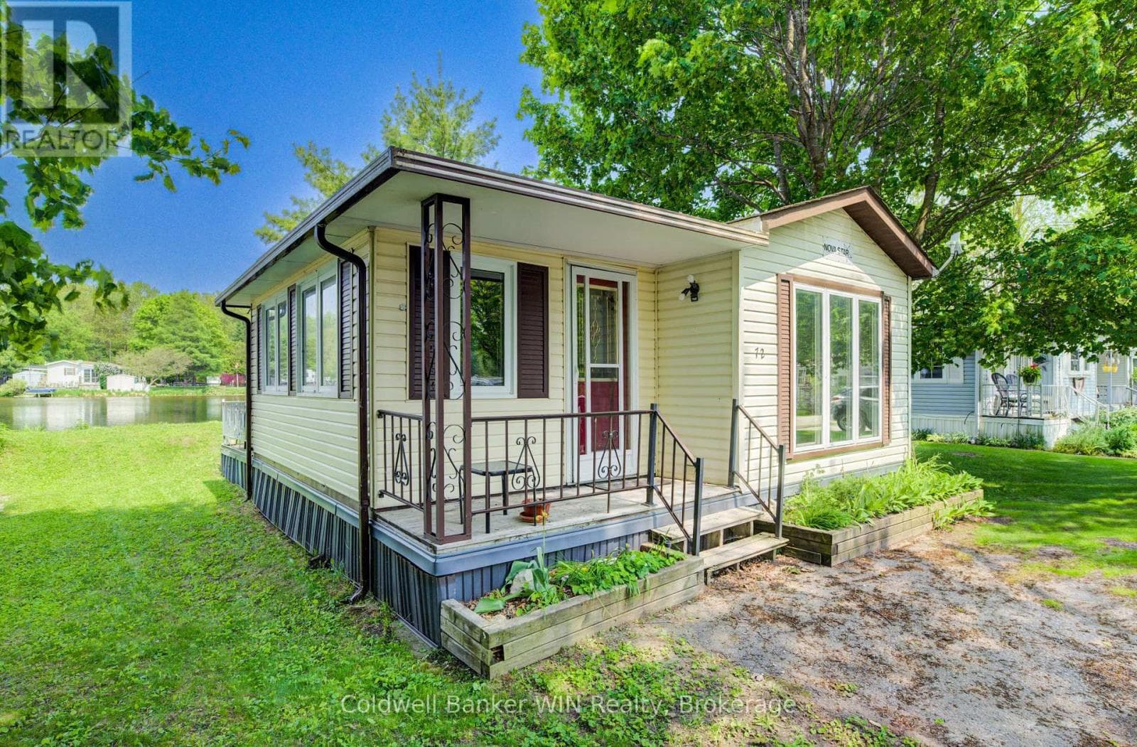 UNIT 72 LAKESIDE - 7489 SIDE ROAD 5 E photo 2