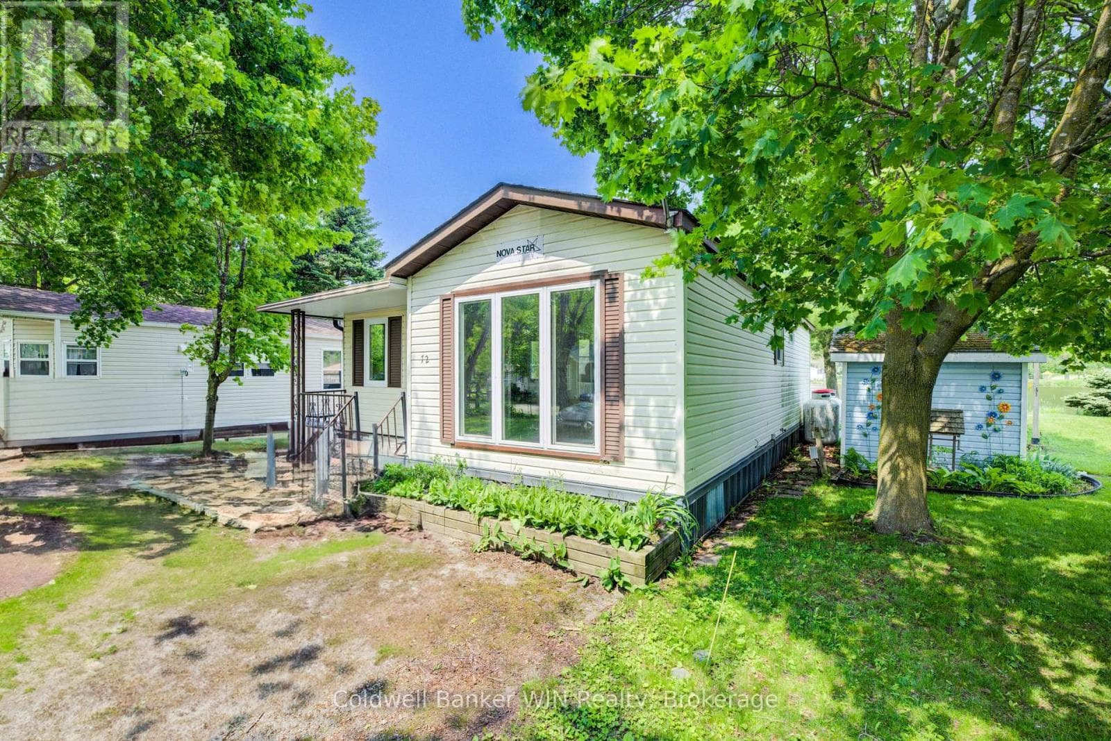 UNIT 72 LAKESIDE - 7489 SIDE ROAD 5 E photo 4
