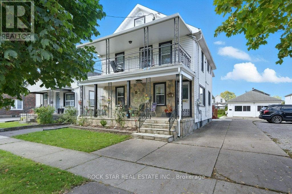 6 bed 4 bath multi-family at 111 MCALPINE AVENUE S — $774,900