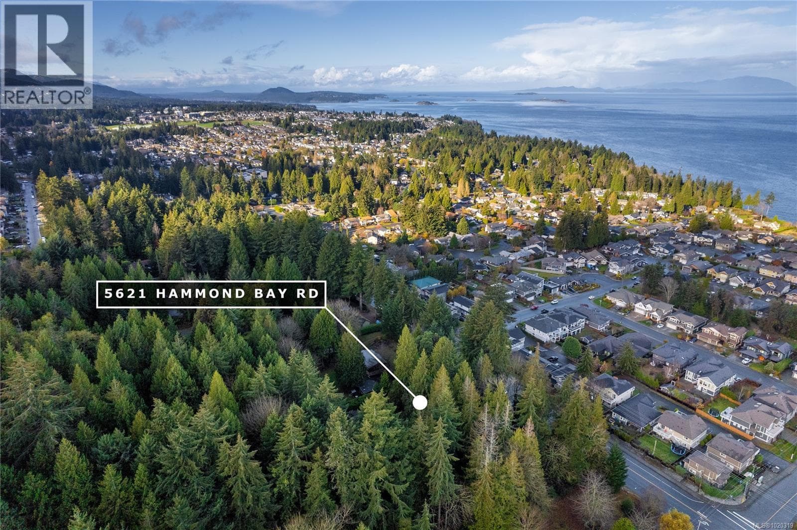 5 bed 3 bath single family at 5621 Hammond Bay Rd — $1,200,000
