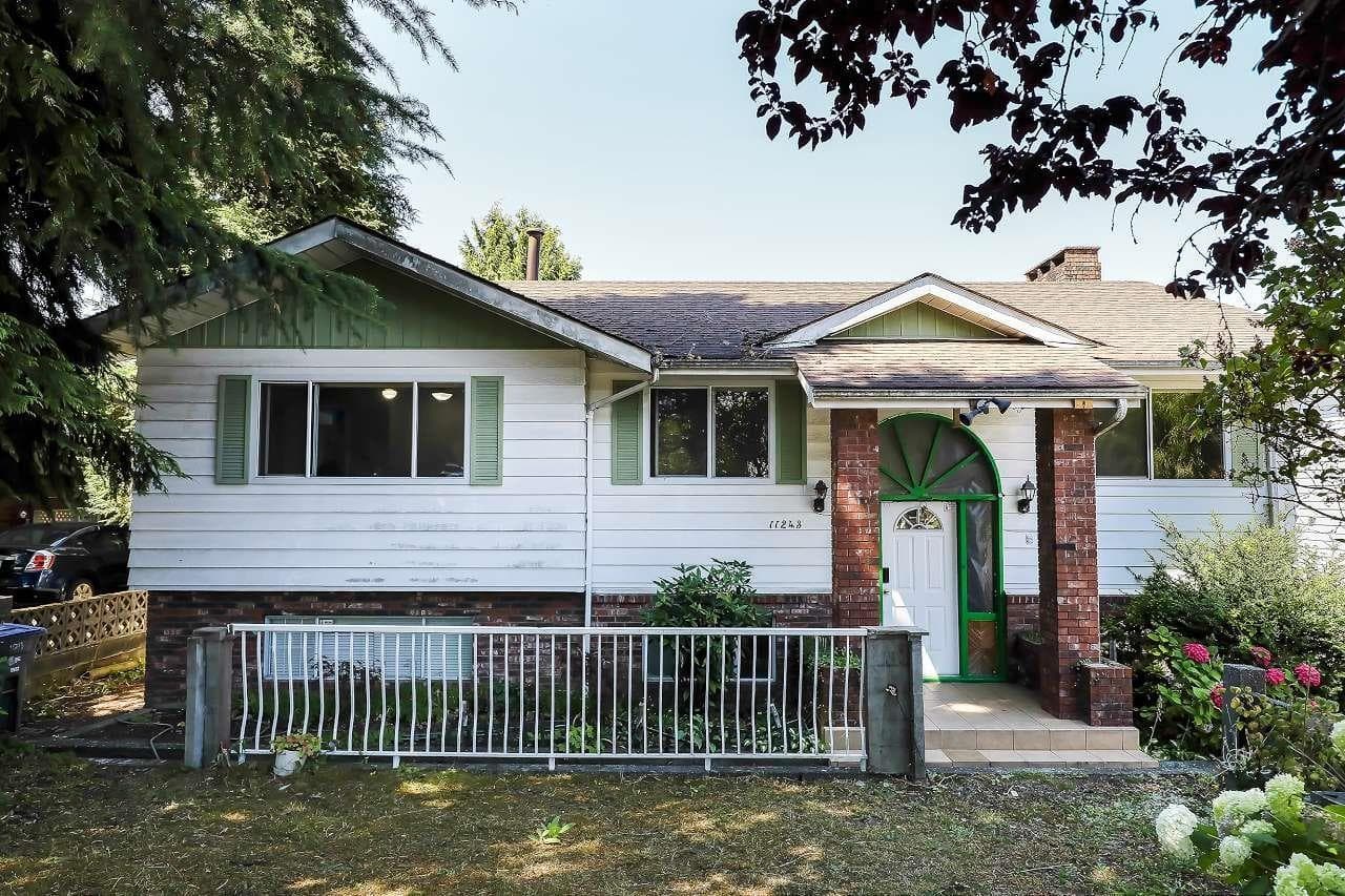 6 bed 3 bath single family at 11243 136 STREET — $1,438,000