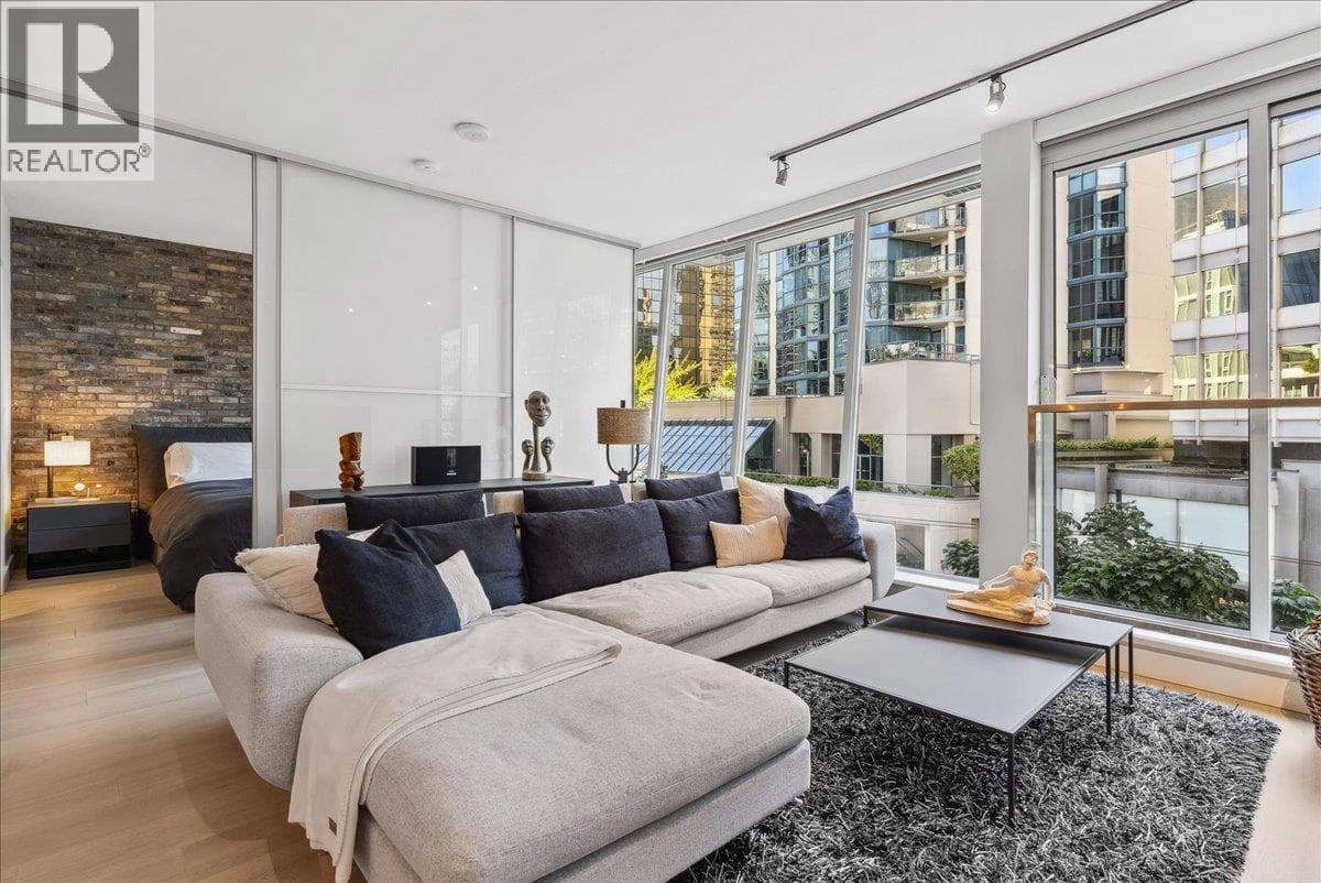 1 bed 1 bath single family at 402 1477 W PENDER STREET — $978,000