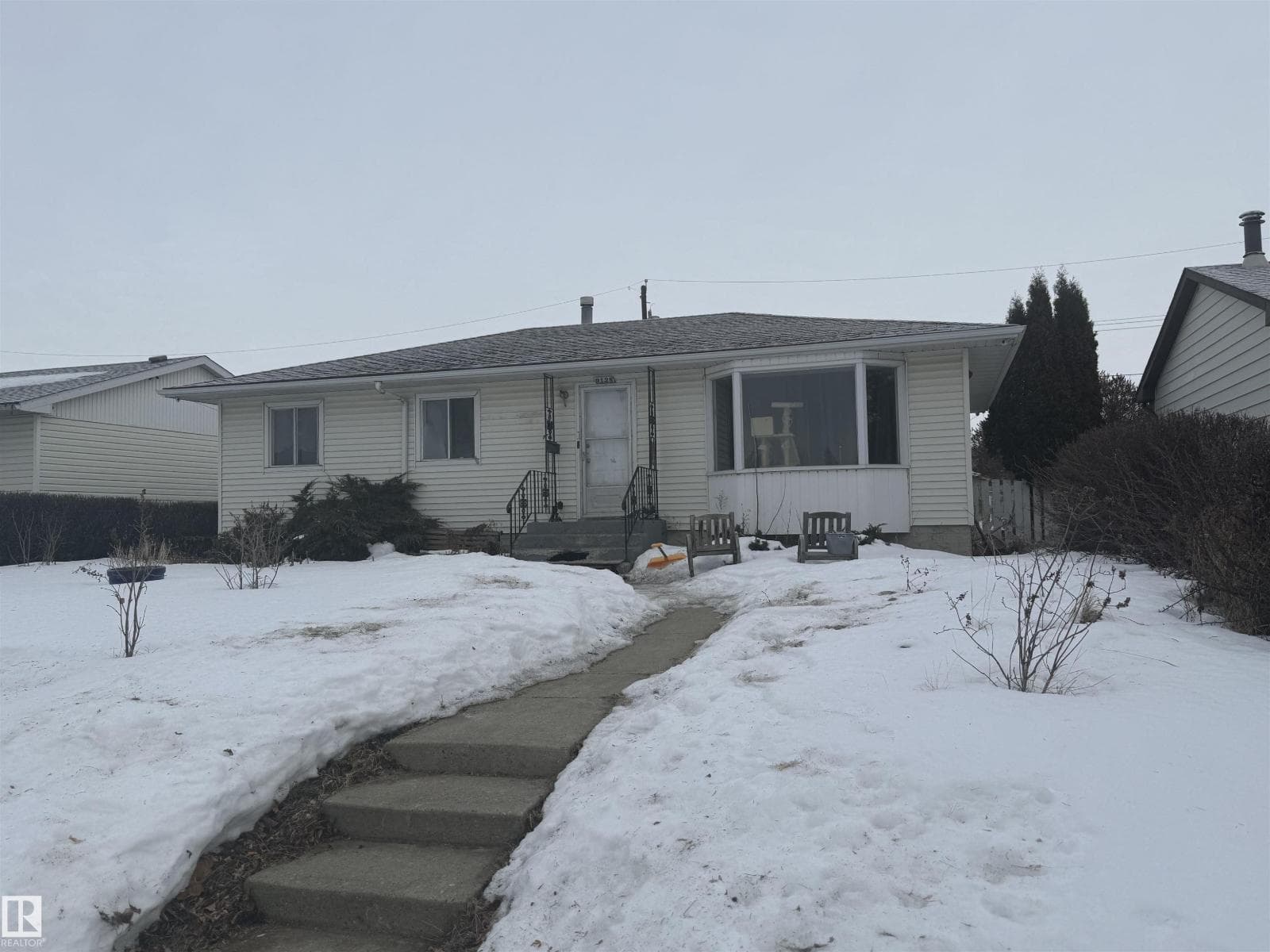 4 bed 2 bath single family at 9128 129b Avenue NW — $370,000