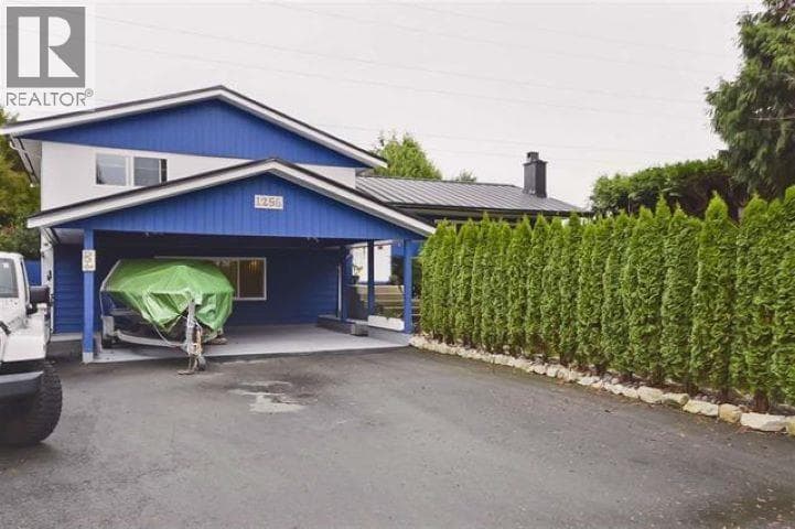 4 bed 3 bath single family at 1256 53A STREET — $1,290,000