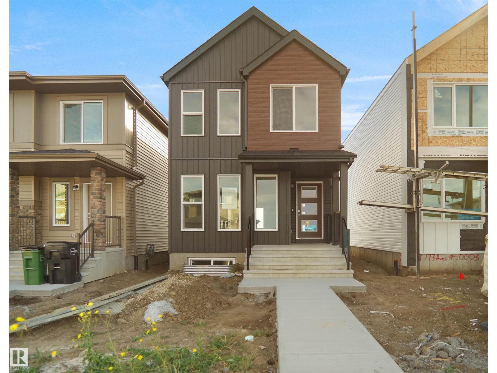 3 bed 3 bath single family at 21035 25 AV NW — $453,576
