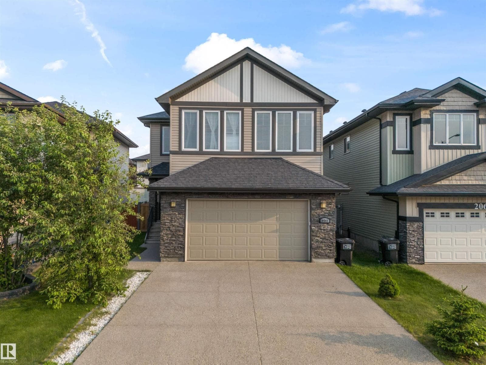 6 bed 4 bath single family at 20641 97A AV NW — $655,000