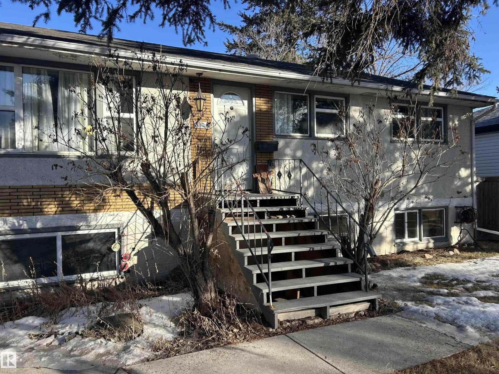 4 bed 2 bath single family at 8342 76 AV NW — $399,900
