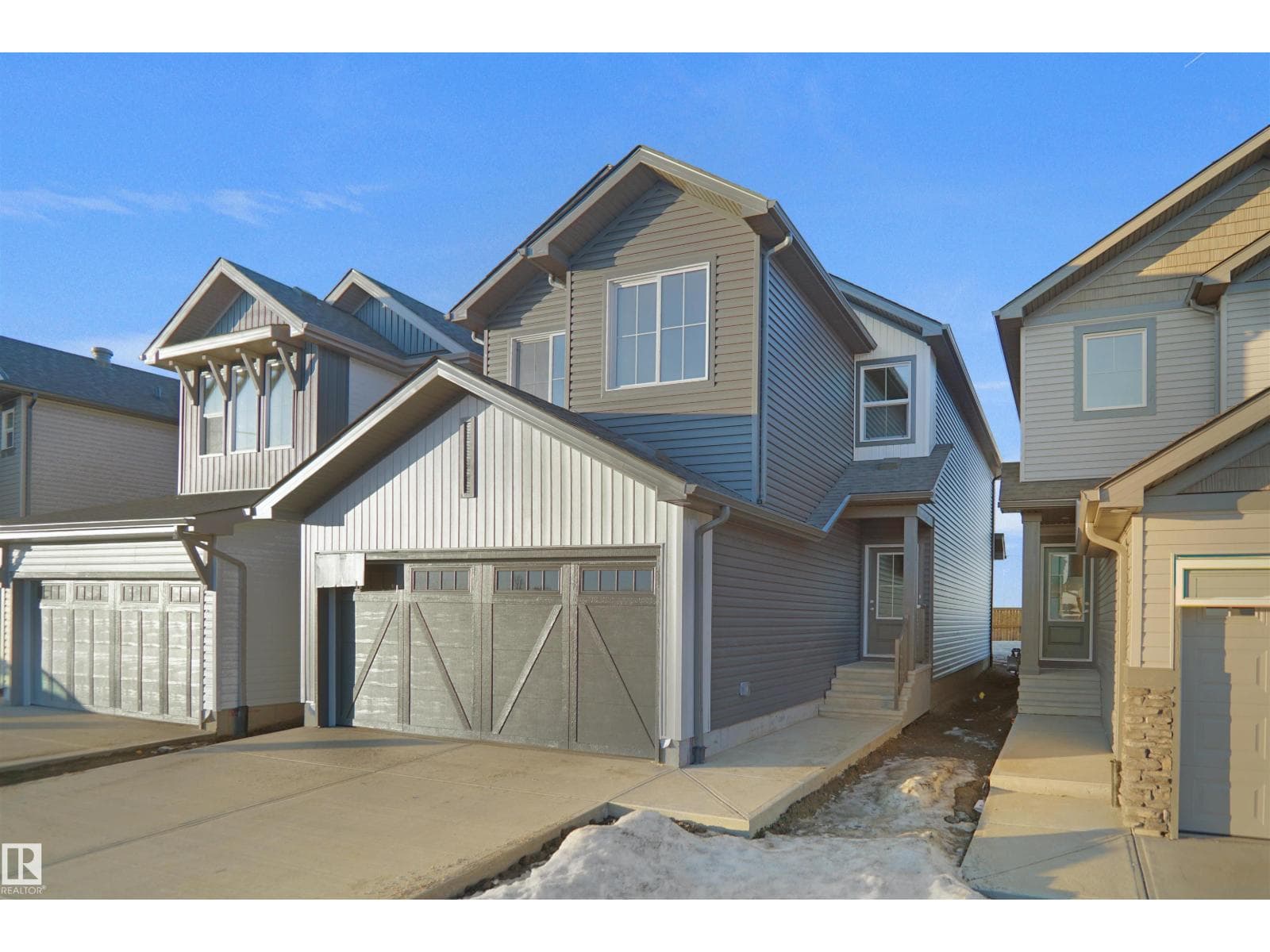 3 bed 3 bath single family at 20940 16 AV NW — $552,297
