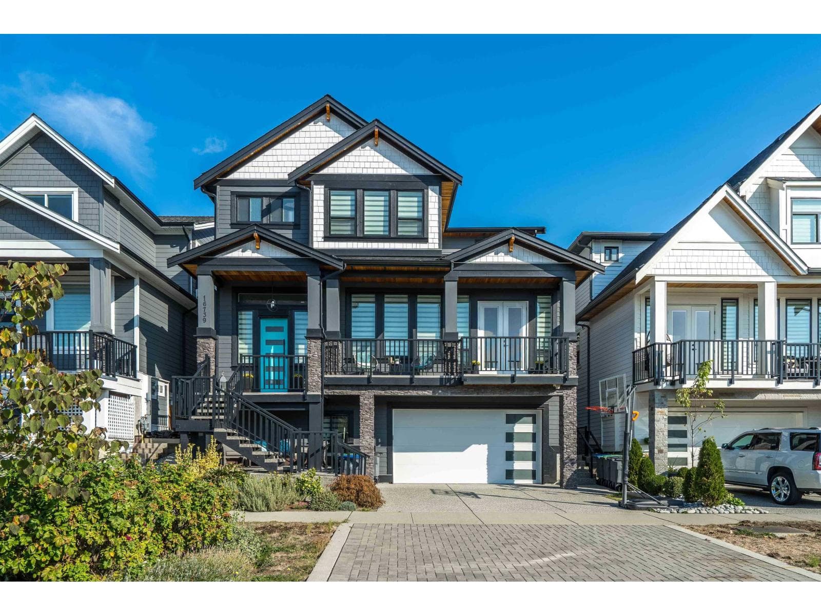 5 bed 6 bath single family at 16739 16A AVENUE — $1,899,000
