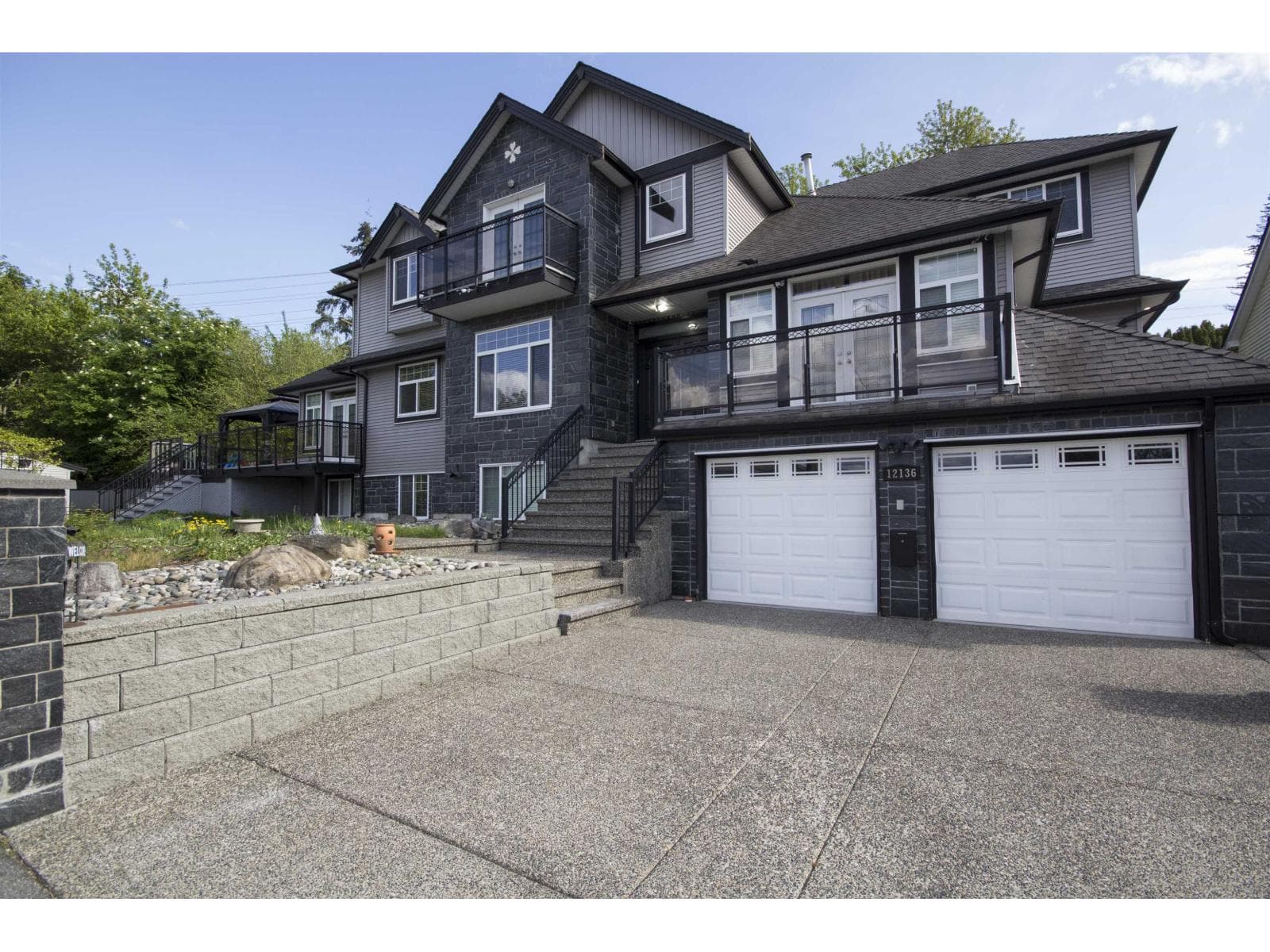9 bed 6 bath single family at 12136 100A AVENUE — $1,950,000