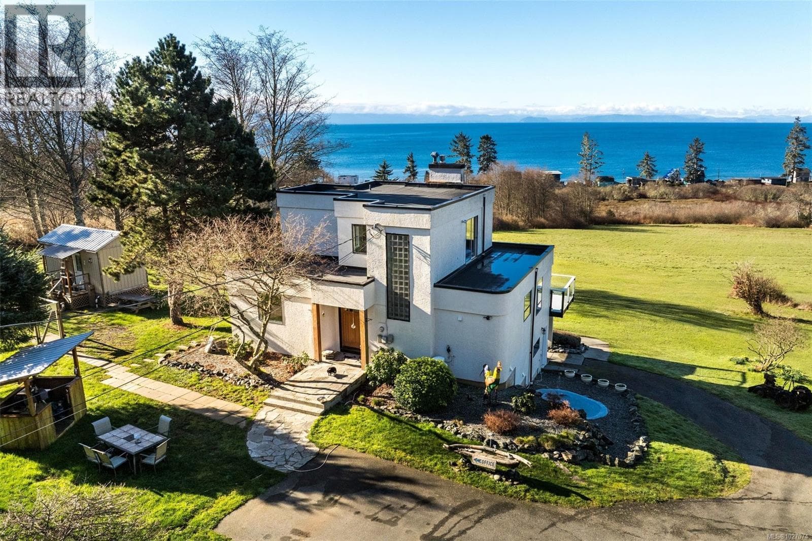 7 bed 6 bath single family at 4537 Otter Point Rd — $1,995,000