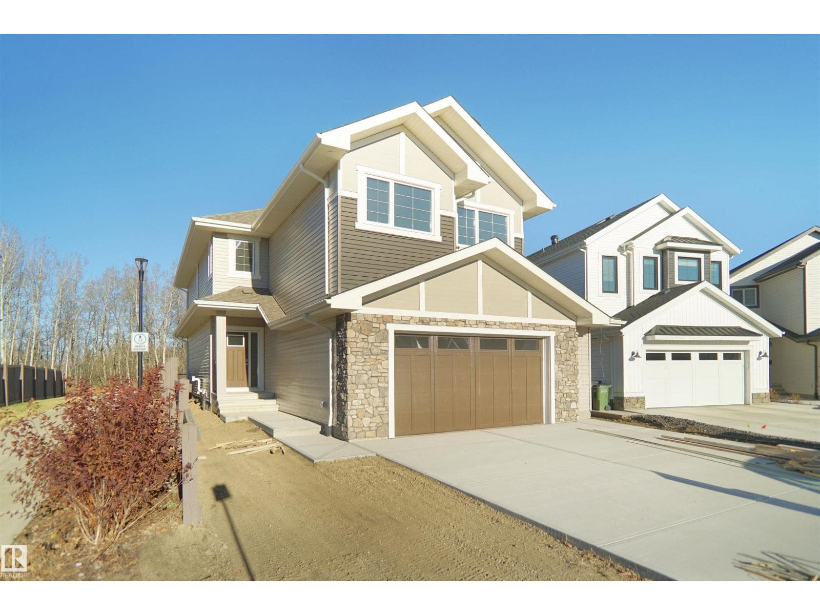 3 bed 3 bath single family at 20608 27 AV NW — $792,747
