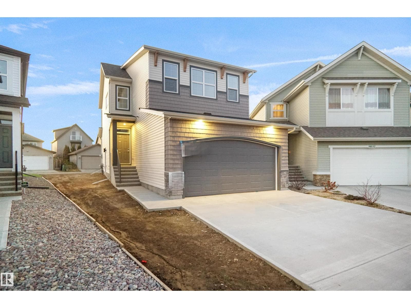 3 bed 3 bath single family at 9828 219 ST NW — $559,900