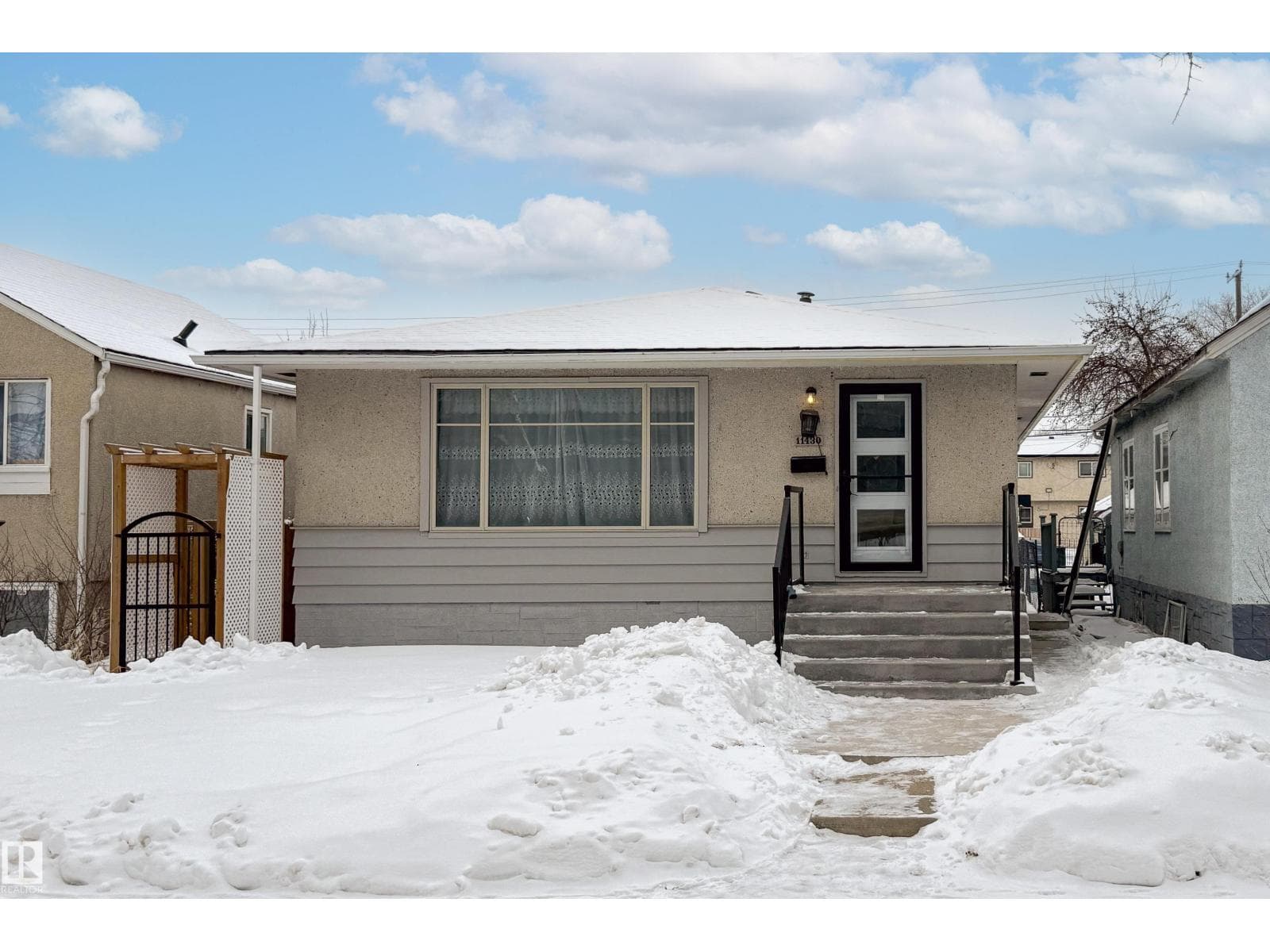 5 bed 2 bath single family at 11430 81 ST NW — $399,900