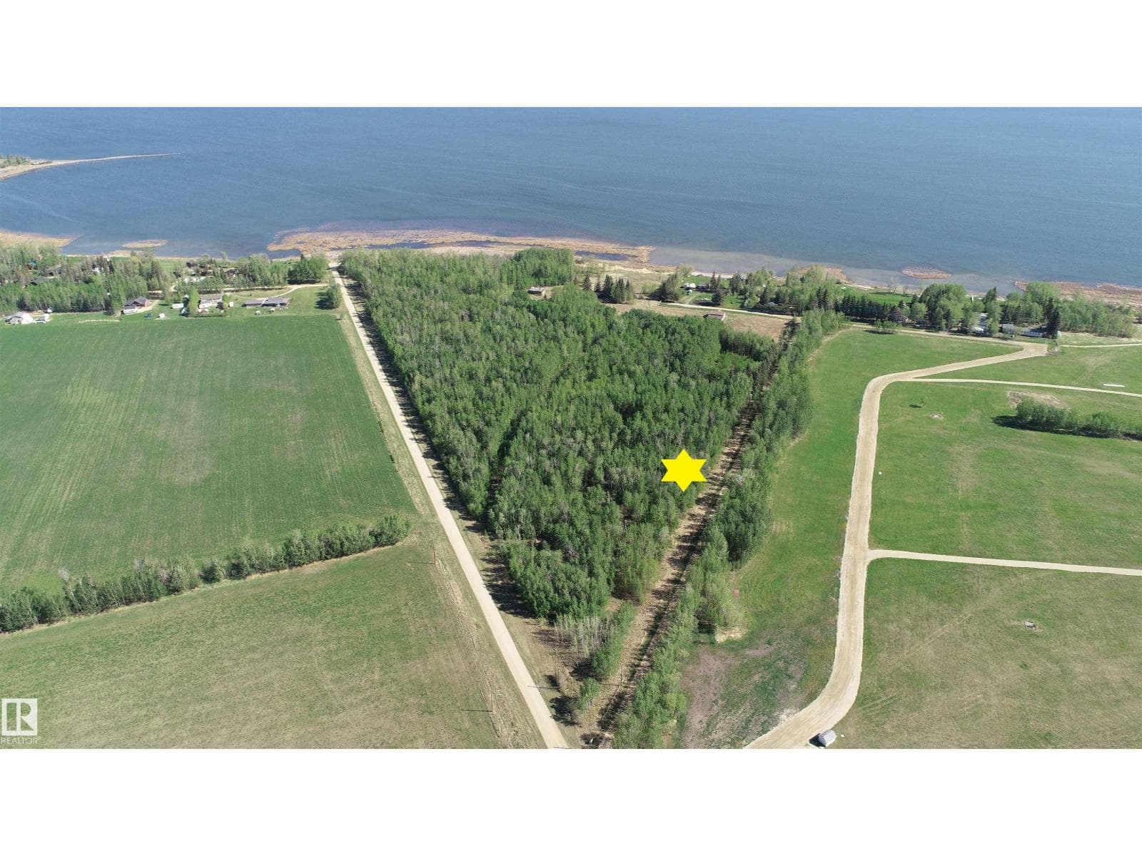 vacant land at 404 54411 RGE RD 40 — $80,000