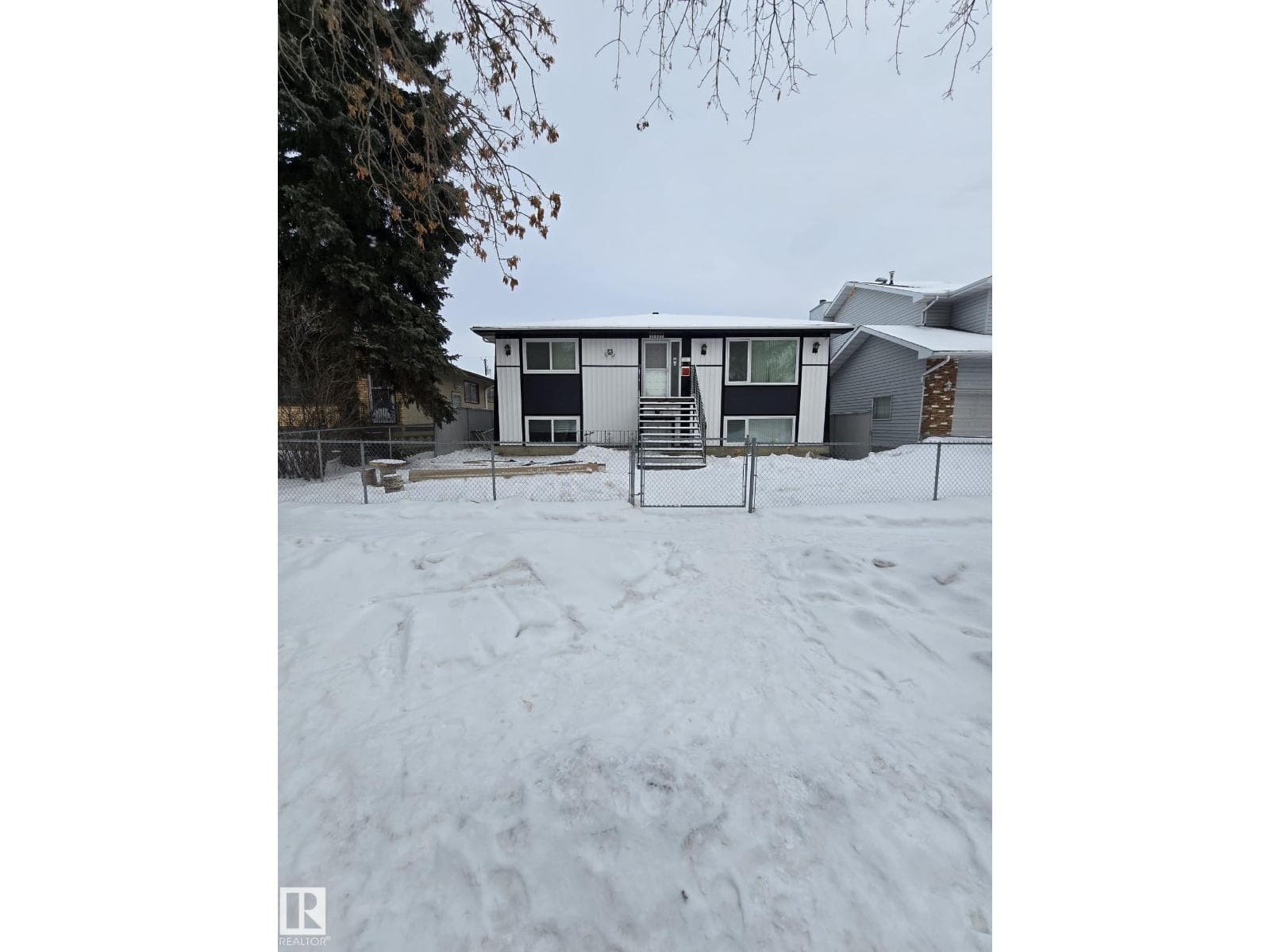 10 bed 5 bath single family at 11927 85 ST NW NW — $710,000