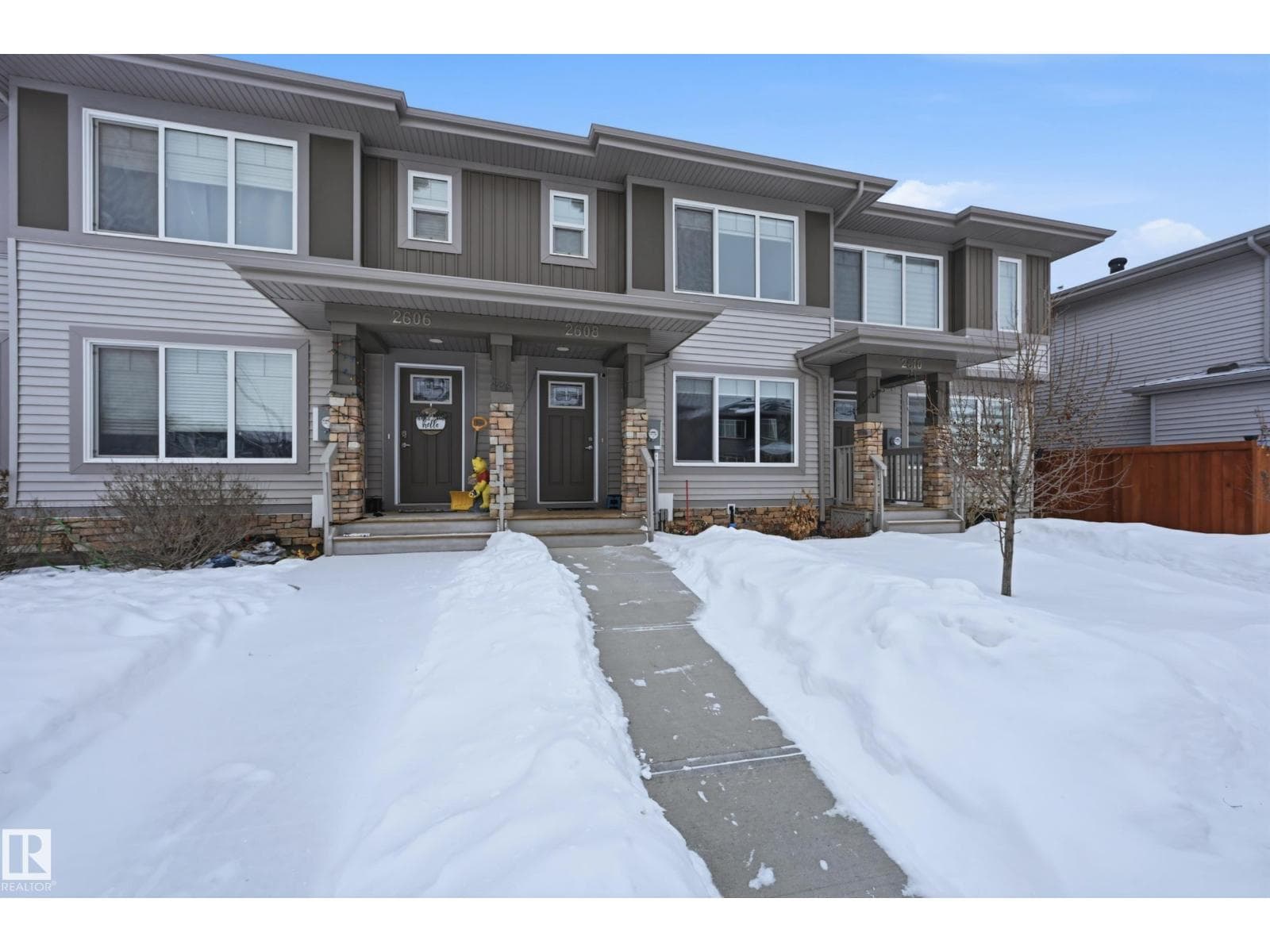3 bed 3 bath single family at 2608 201 Street NW NW — $409,000