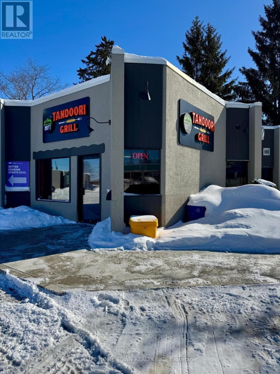 business at UNIT 1 - 392 MAIN  N STREET — $1