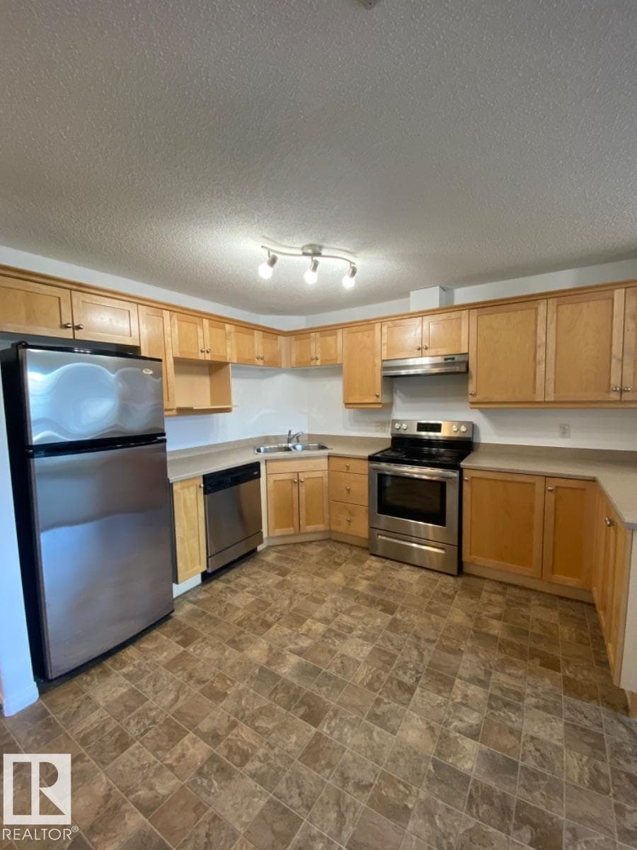 #6329 7331 SOUTH TERWILLEGAR DR NW photo 2