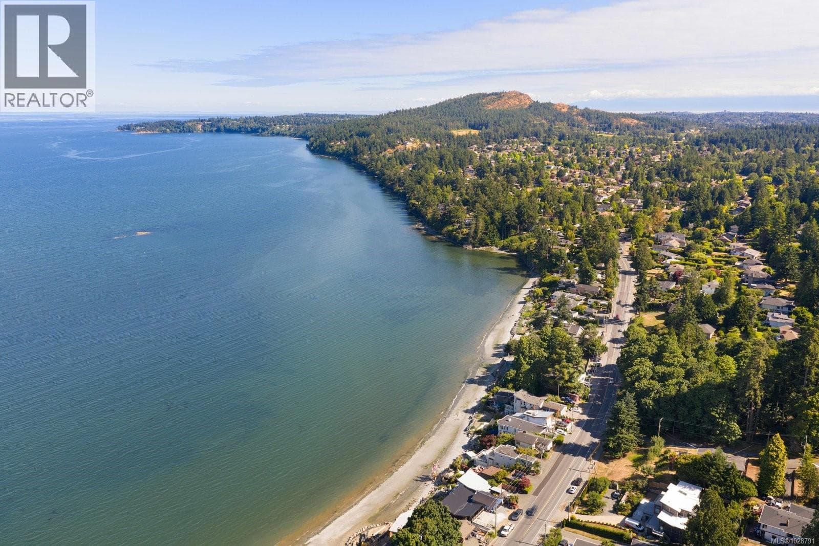 2 bed 1 bath single family at 5015 Cordova Bay Rd — $1,250,000