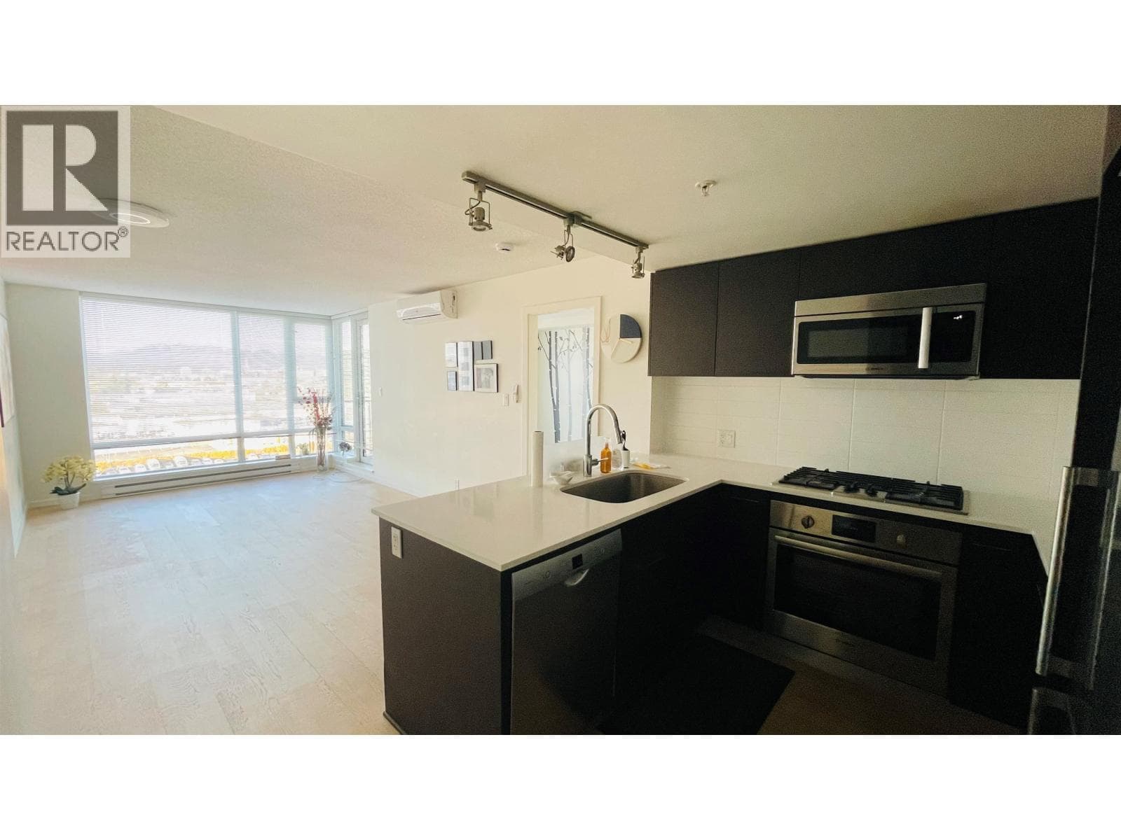 2 bed 2 bath single family at 1107 7788 ACKROYD ROAD — $739,000