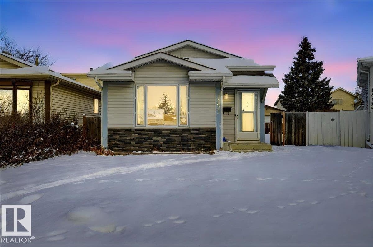 4 bed 2 bath single family at 15621 83A ST NW — $350,000