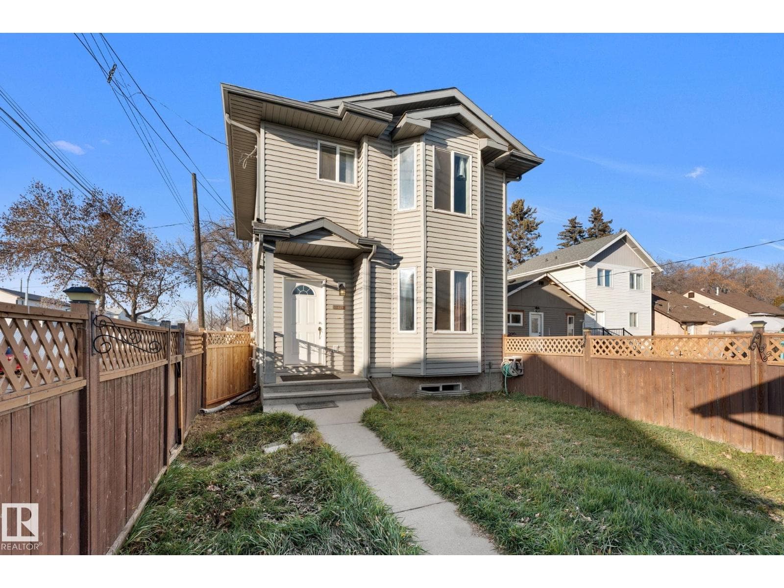 4 bed 4 bath single family at 12713 116 ST NW — $372,999