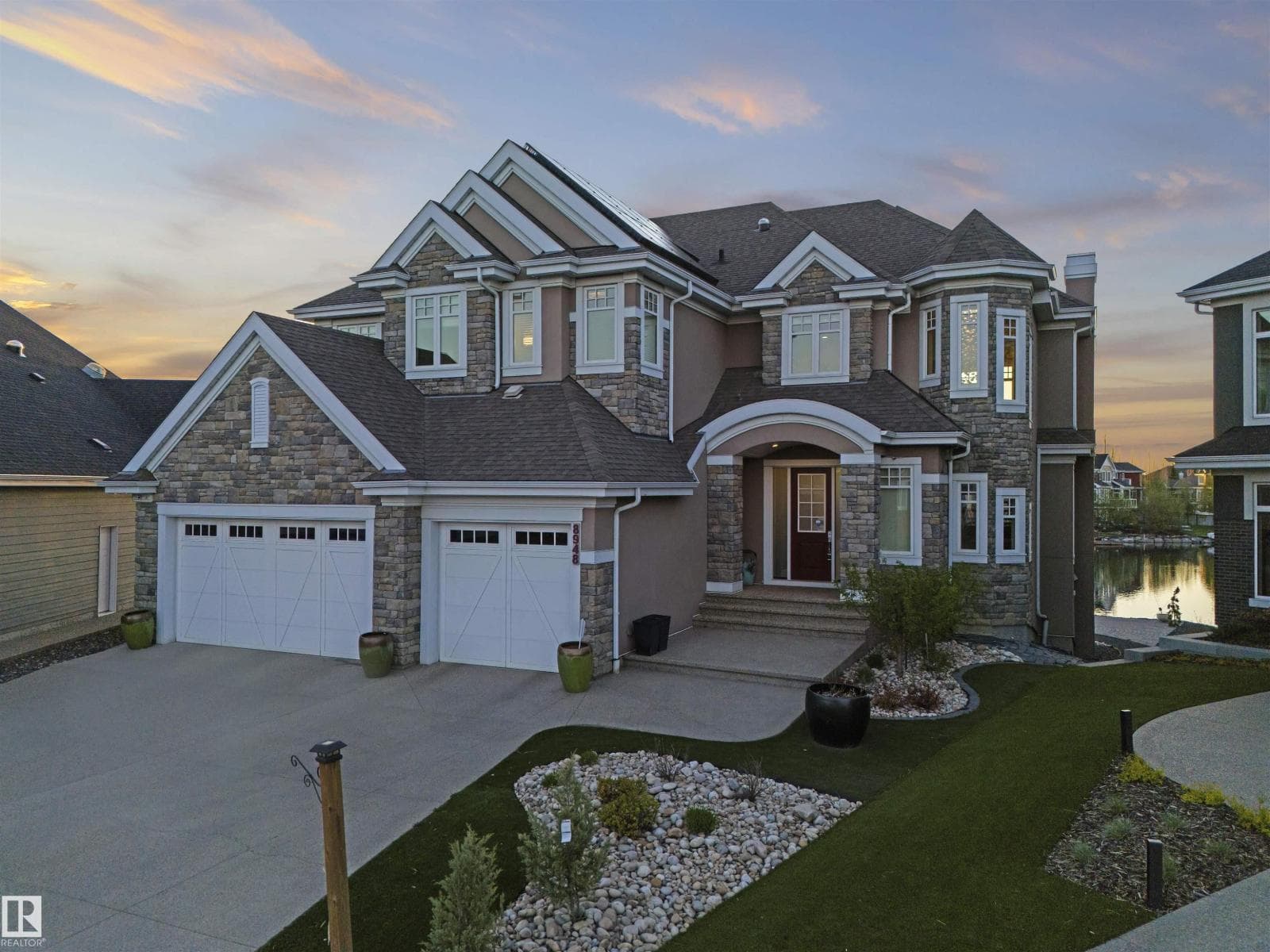 5 bed 5 bath single family at 8948 20 AV SW — $2,699,900