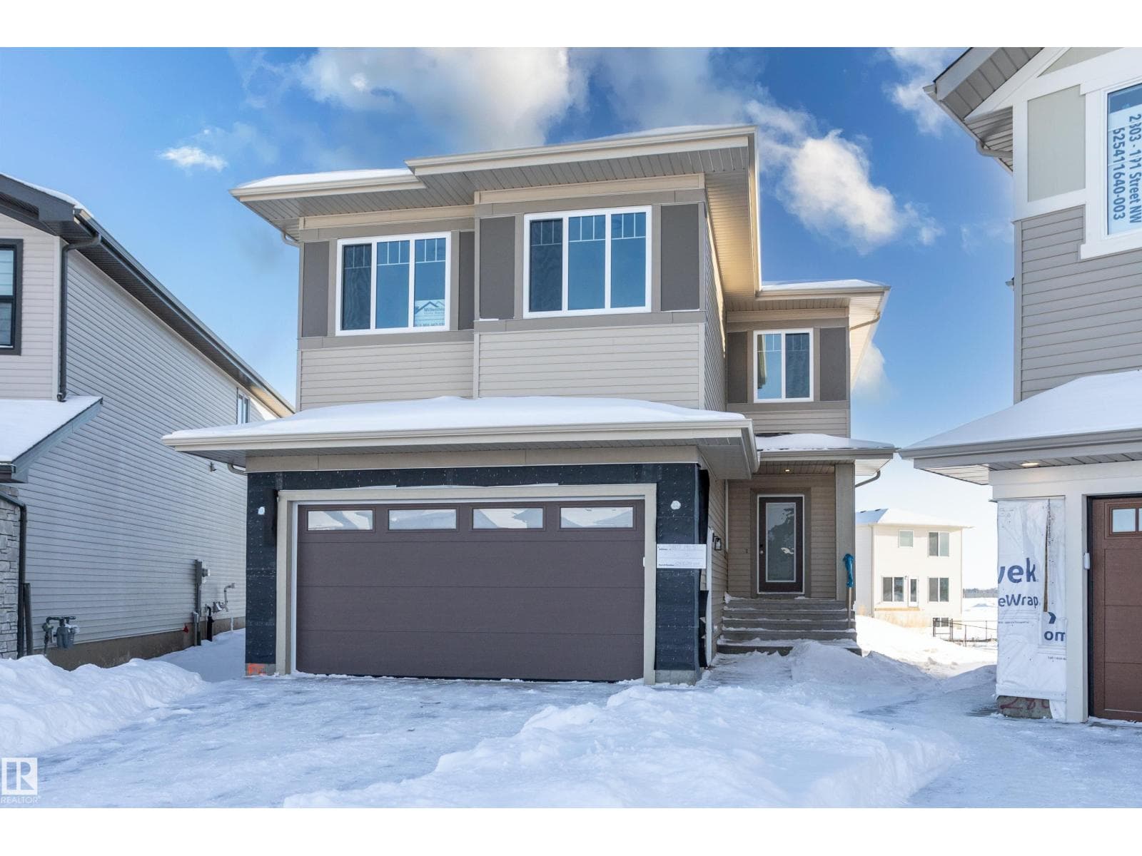 4 bed 4 bath single family at 2807 191 ST NW — $639,900