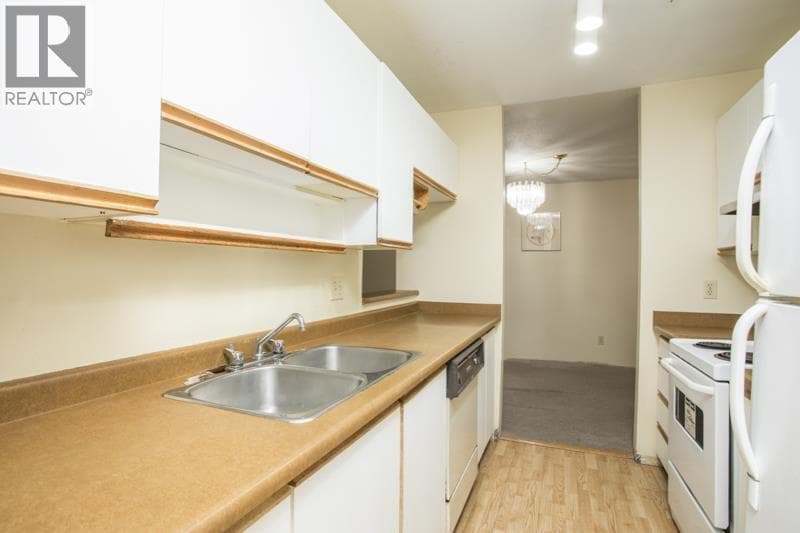 114 7751 MINORU BOULEVARD photo 3