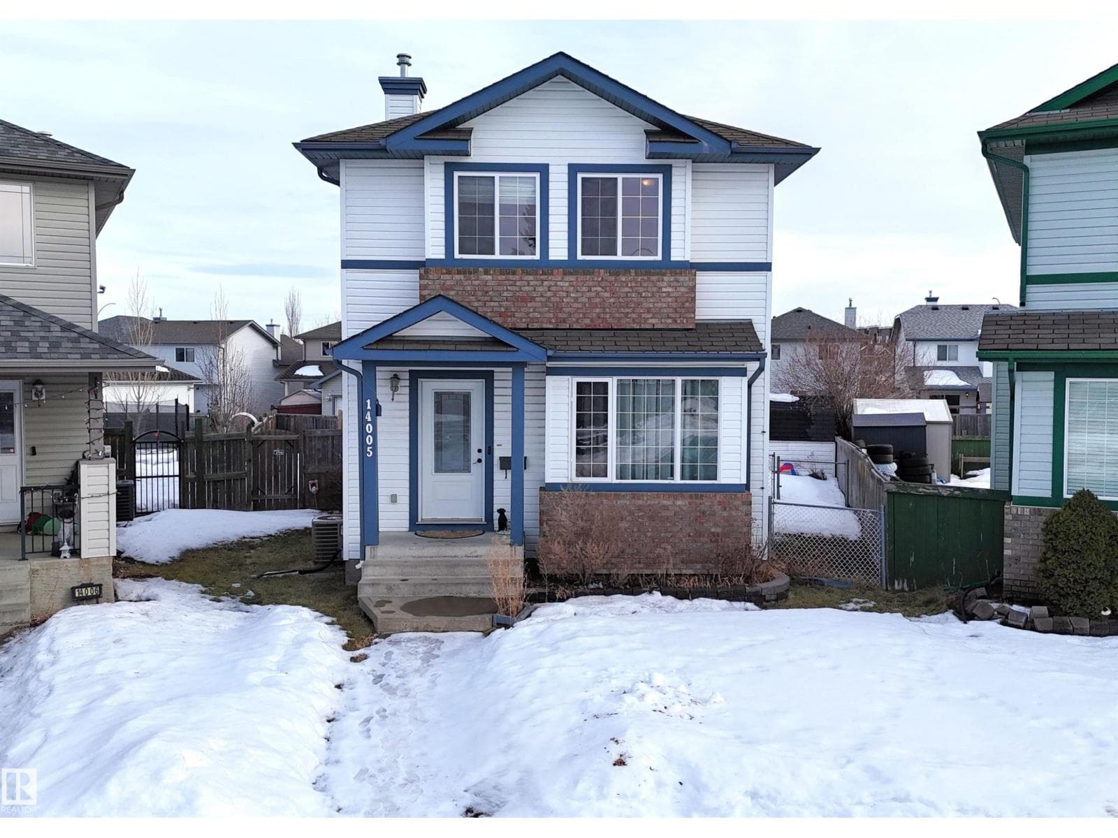 3 bed 3 bath single family at 14005 158A AV NW — $415,000