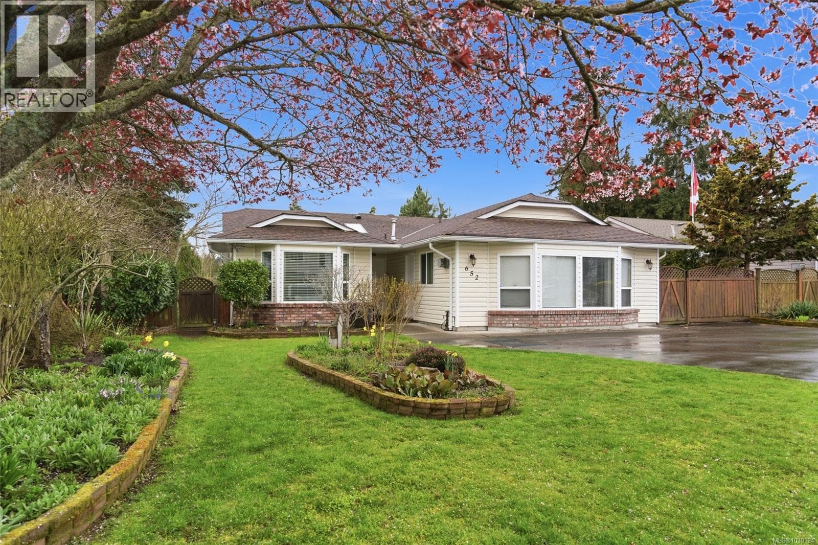 3 bed 3 bath single family at 652 Ermineskin Ave — $749,000