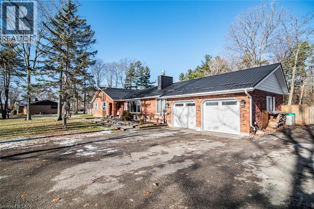 4 bed 3 bath single family at 7087 RAINHAM Road — $923,000