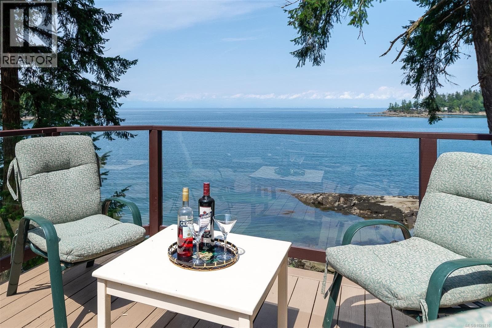 5 bed 3 bath single family at 1 835 Sturdies Bay Rd — $1,998,000