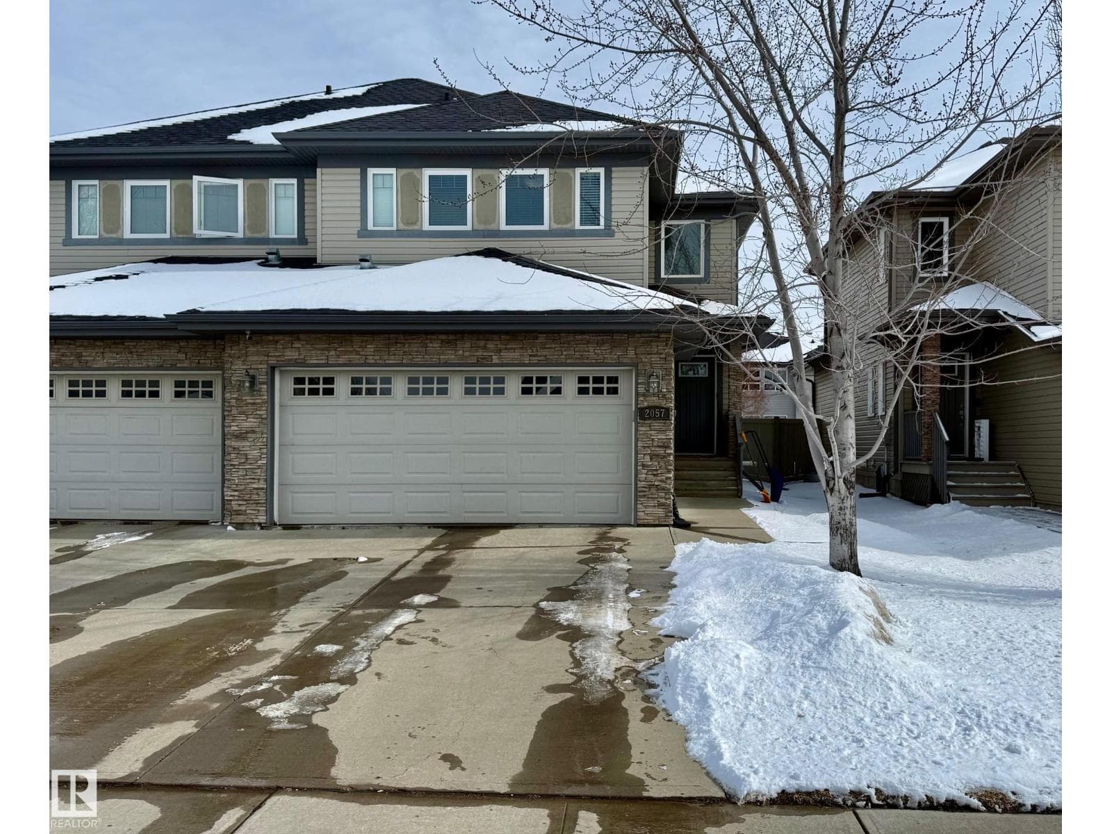 3 bed 3 bath single family at 2057 69A ST SW — $474,900