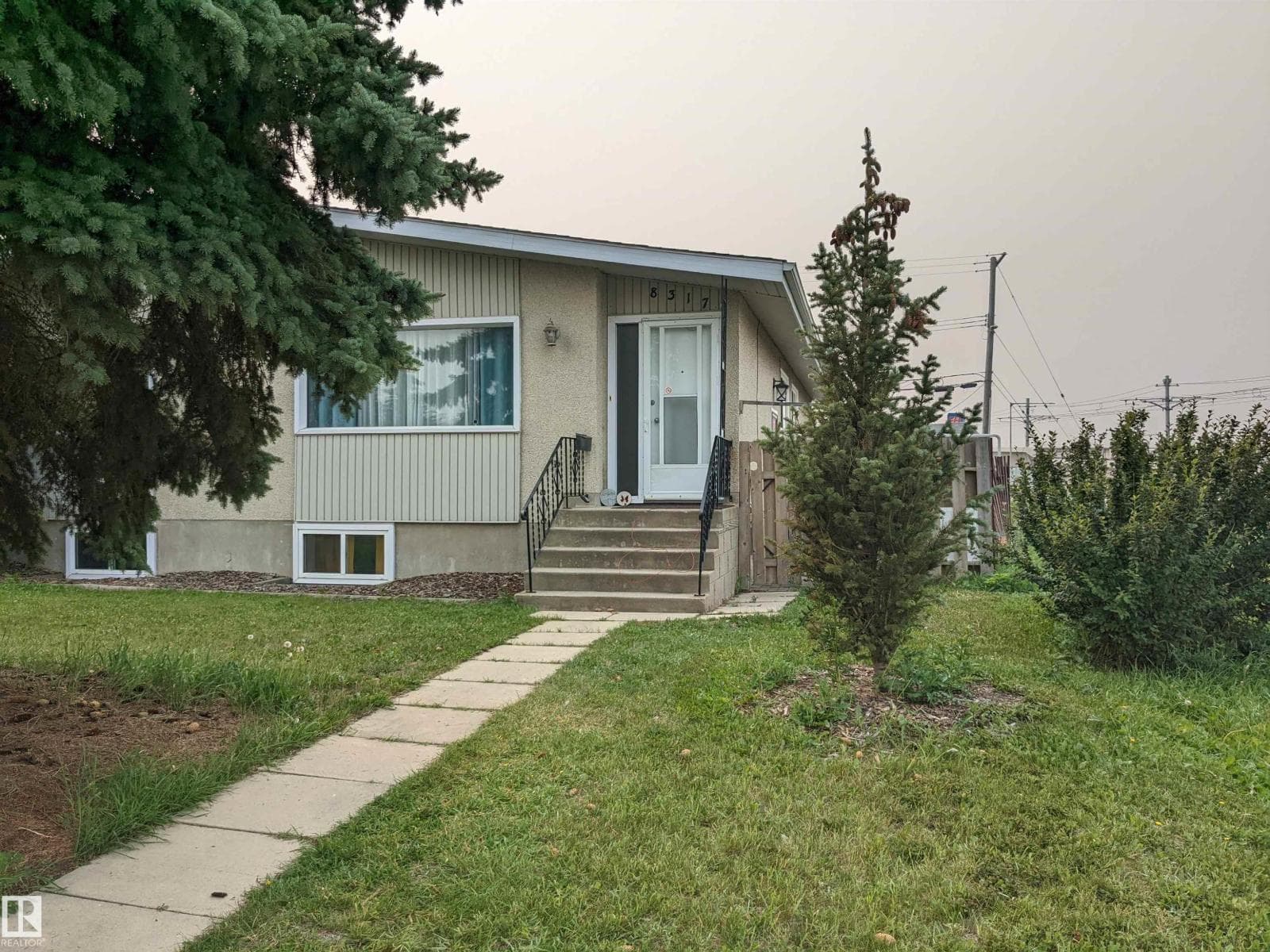 5 bed 2 bath single family at 8317 69 AV NW — $395,000