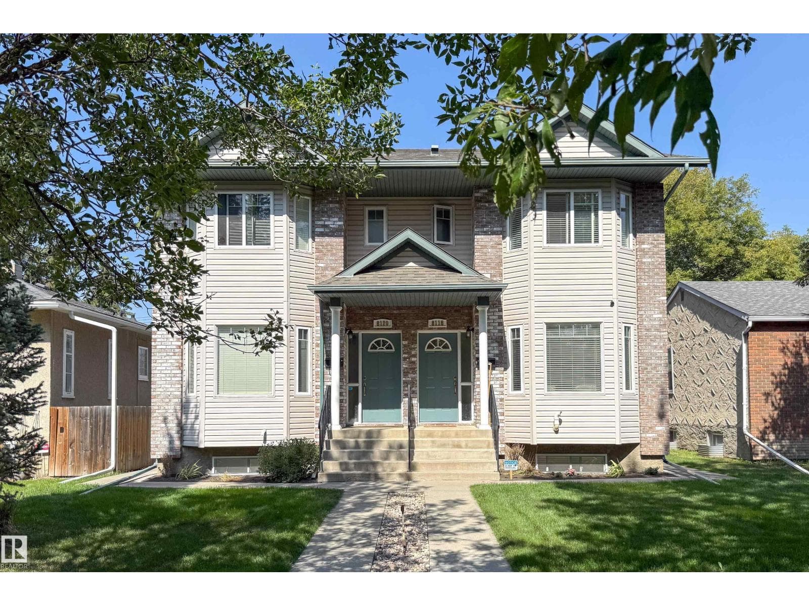 4 bed 4 bath single family at 8118-8120 81 AV NW — $999,000
