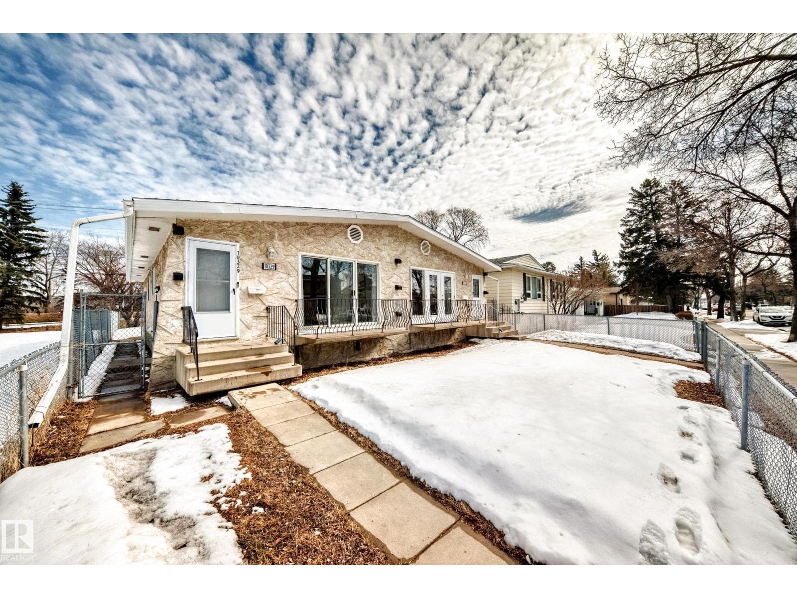 5 bed 2 bath single family at 10329 150 ST NW — $393,200
