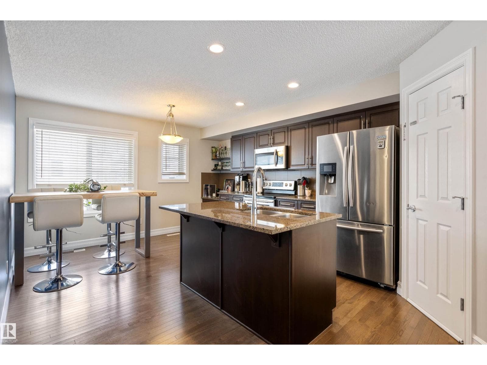 #64 655 TAMARACK RD NW photo 3