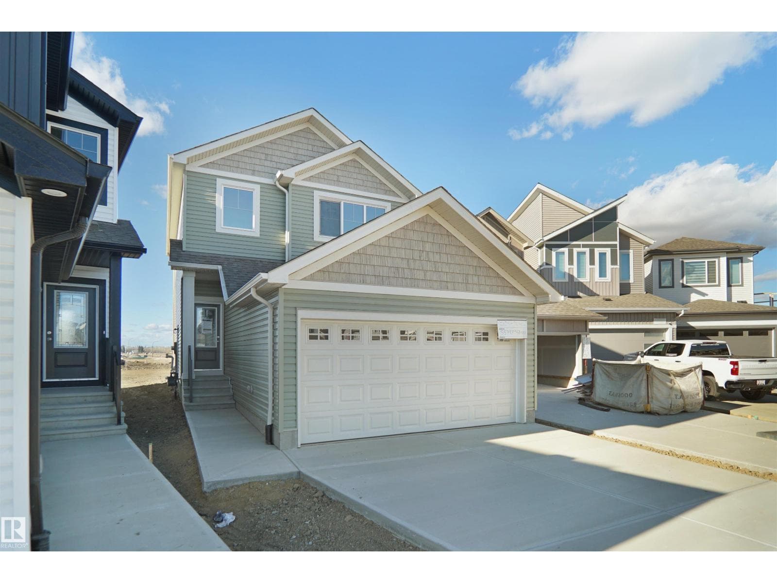 3 bed 3 bath single family at 1535 208 ST NW — $559,647