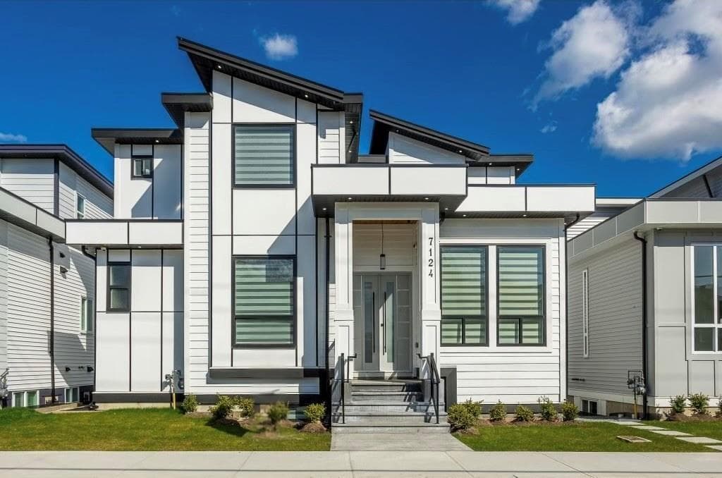 7 bed 6 bath single family at 7124 192 STREET — $1,599,900