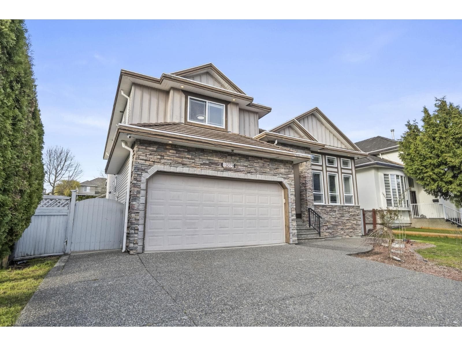 8 bed 6 bath single family at 15079 67 AVENUE — $1,899,900