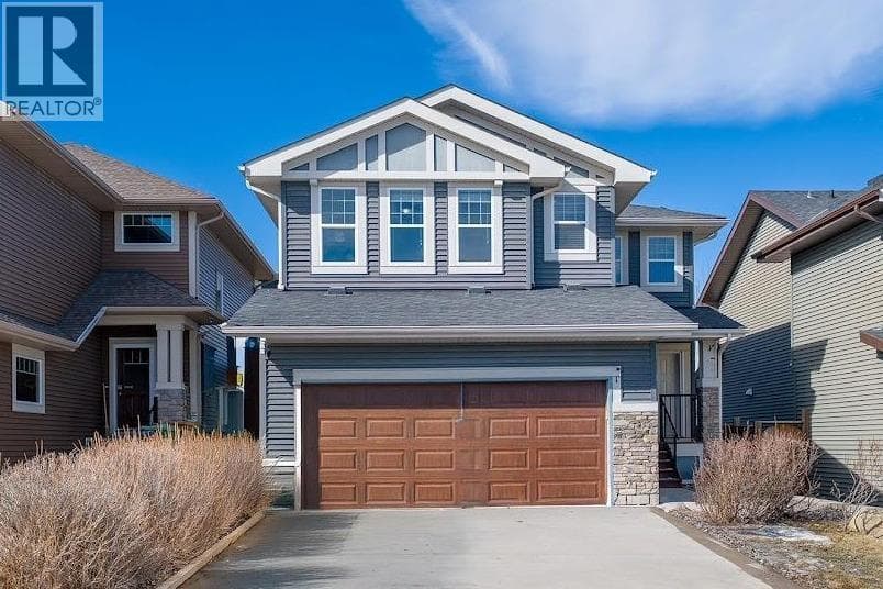 5 bed 4 bath single family at 31 Jumping Pound Rise — $689,900