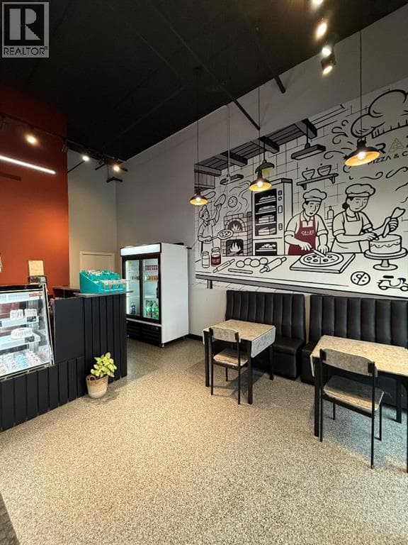 business at 4715 88 Avenue NE — $299,999