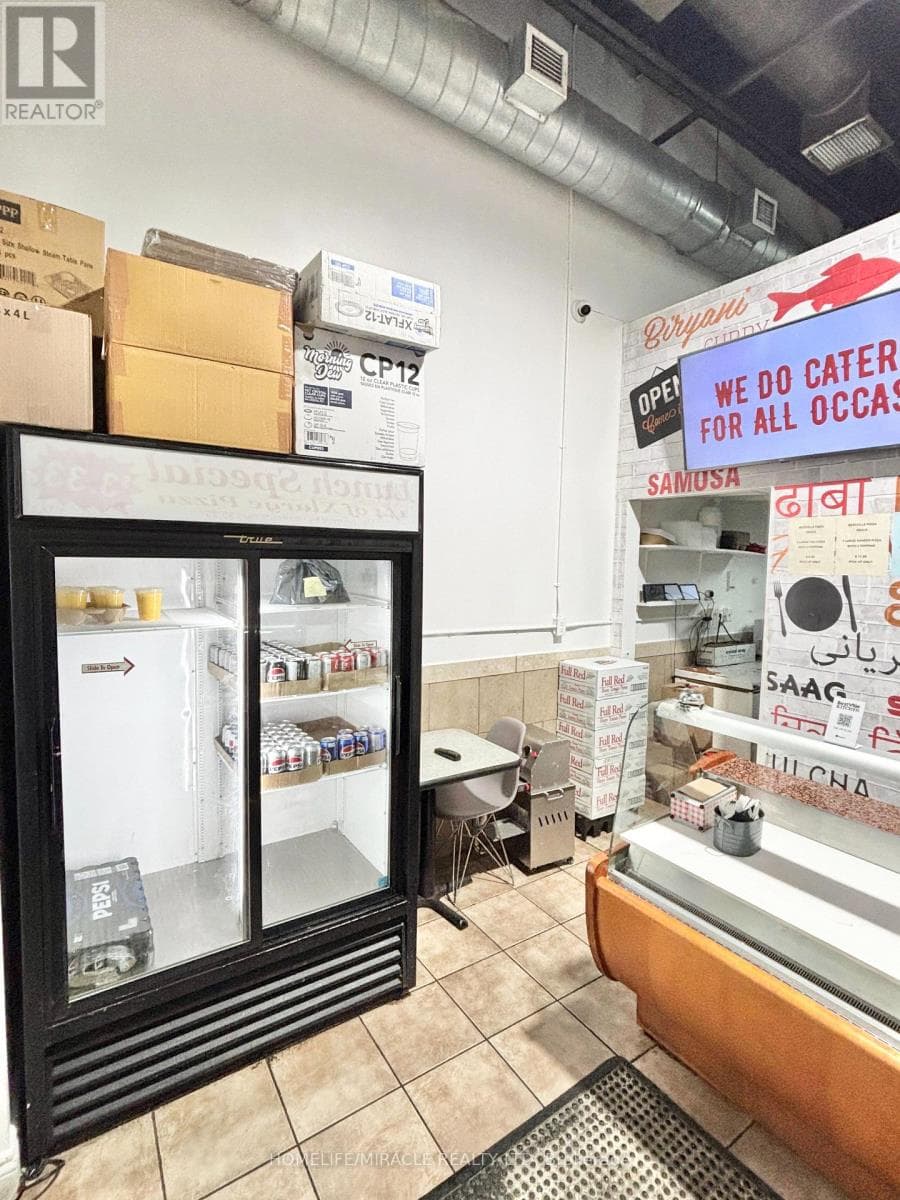 business at J - 500 CAN-AMERA PARKWAY — $99,000