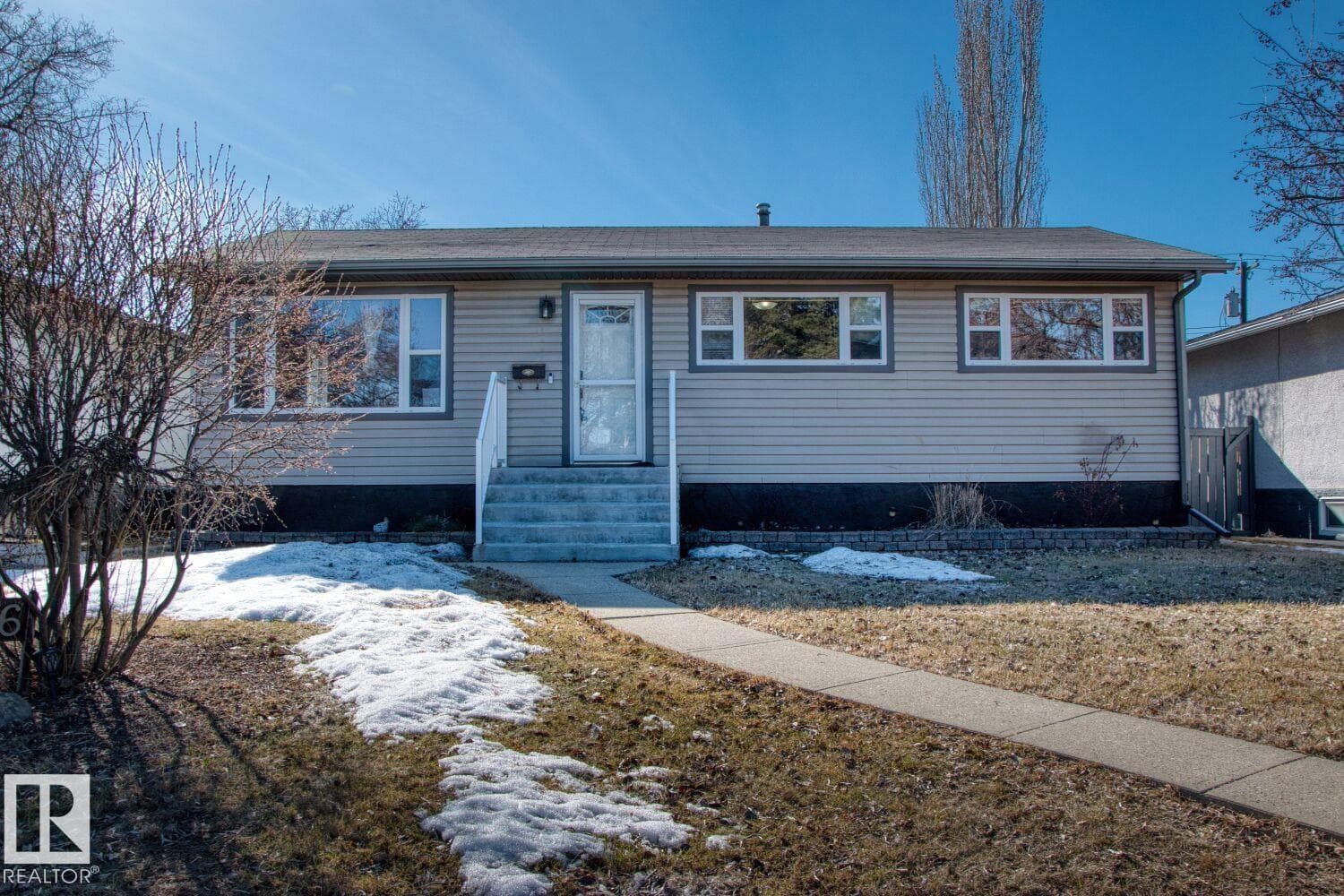 4 bed 2 bath single family at 8916 148 ST NW — $588,000