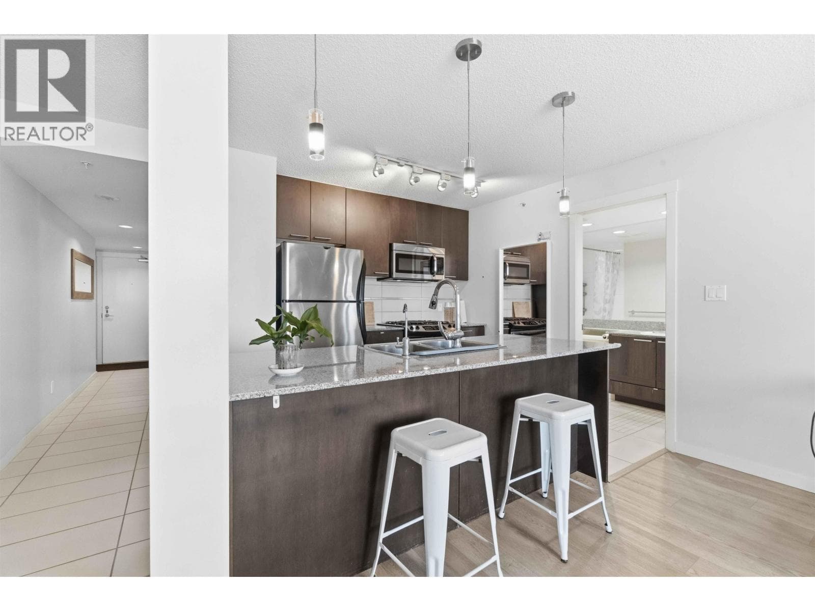 1 bed 1 bath single family at 1612 5811 NO. 3 ROAD — $575,000