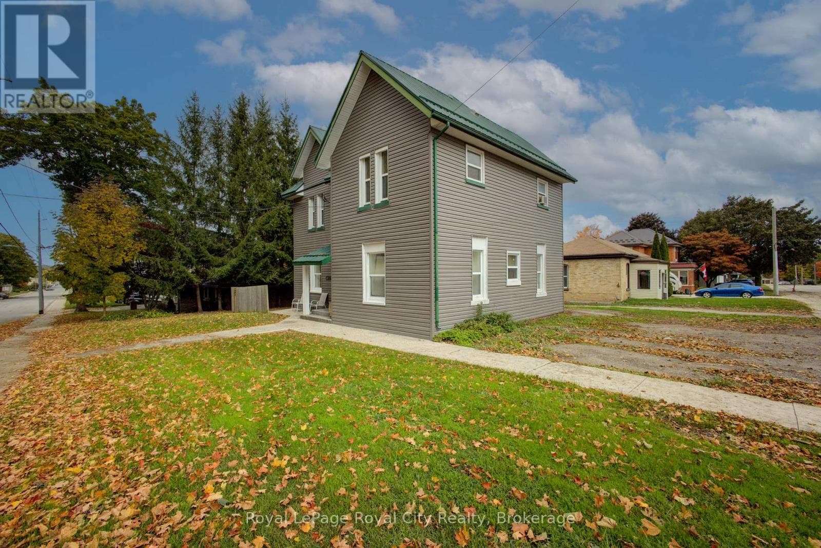 4 bed 4 bath multi-family at 103 PATRICK STREET E — $499,900