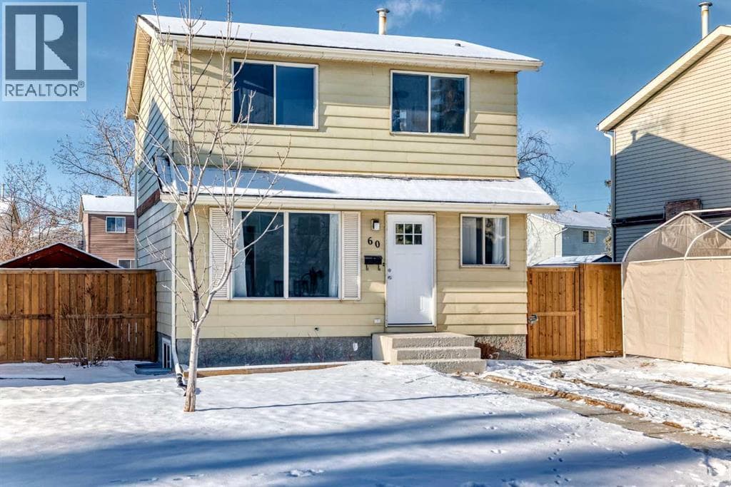 3 bed 2 bath single family at 60 Erin Mount Crescent SE — $469,900