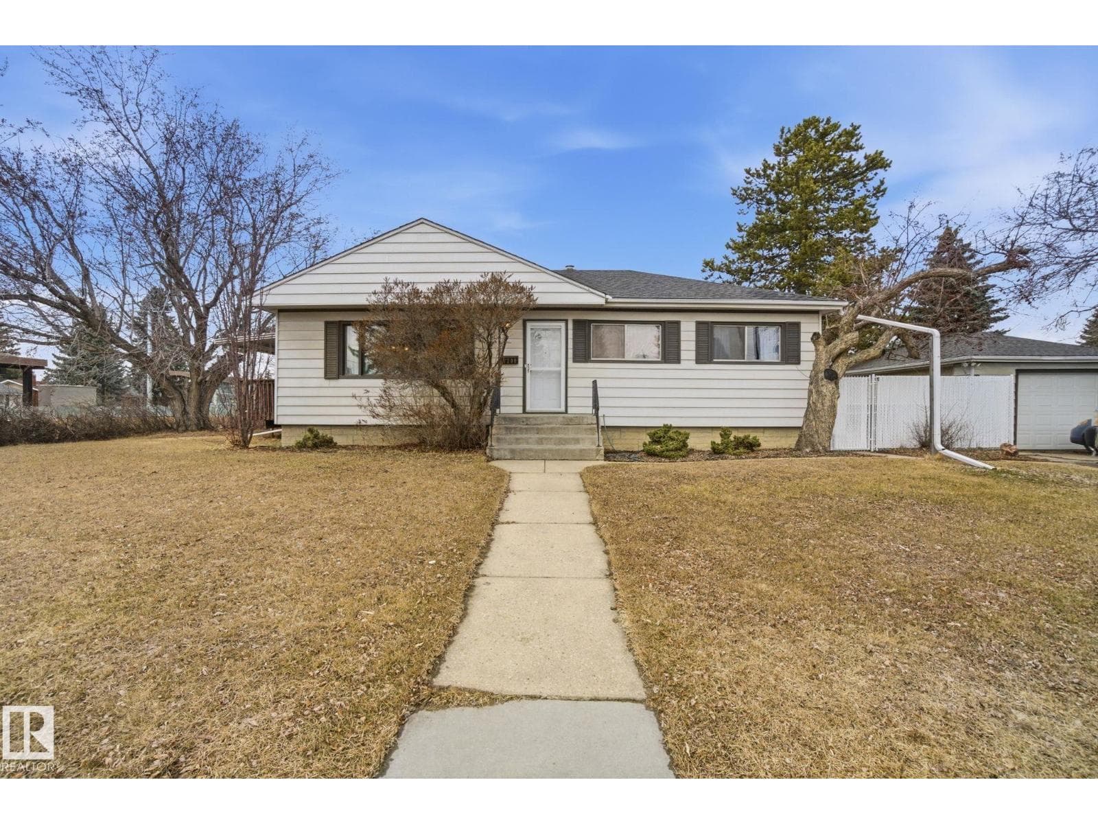 4 bed 2 bath single family at 8208 73 AV NW — $395,000